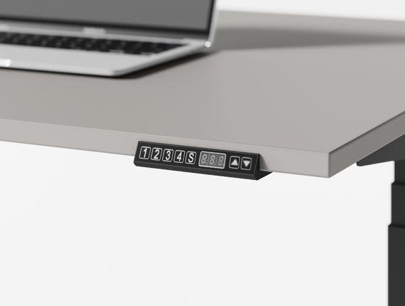Détail du boîtier de commande d\'un bureau électrique réglable
