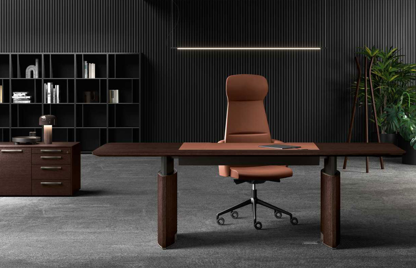 Bureau de direction r&eacute;glable Gorzano en ambiance avec fauteuil et biblioth&egrave;que