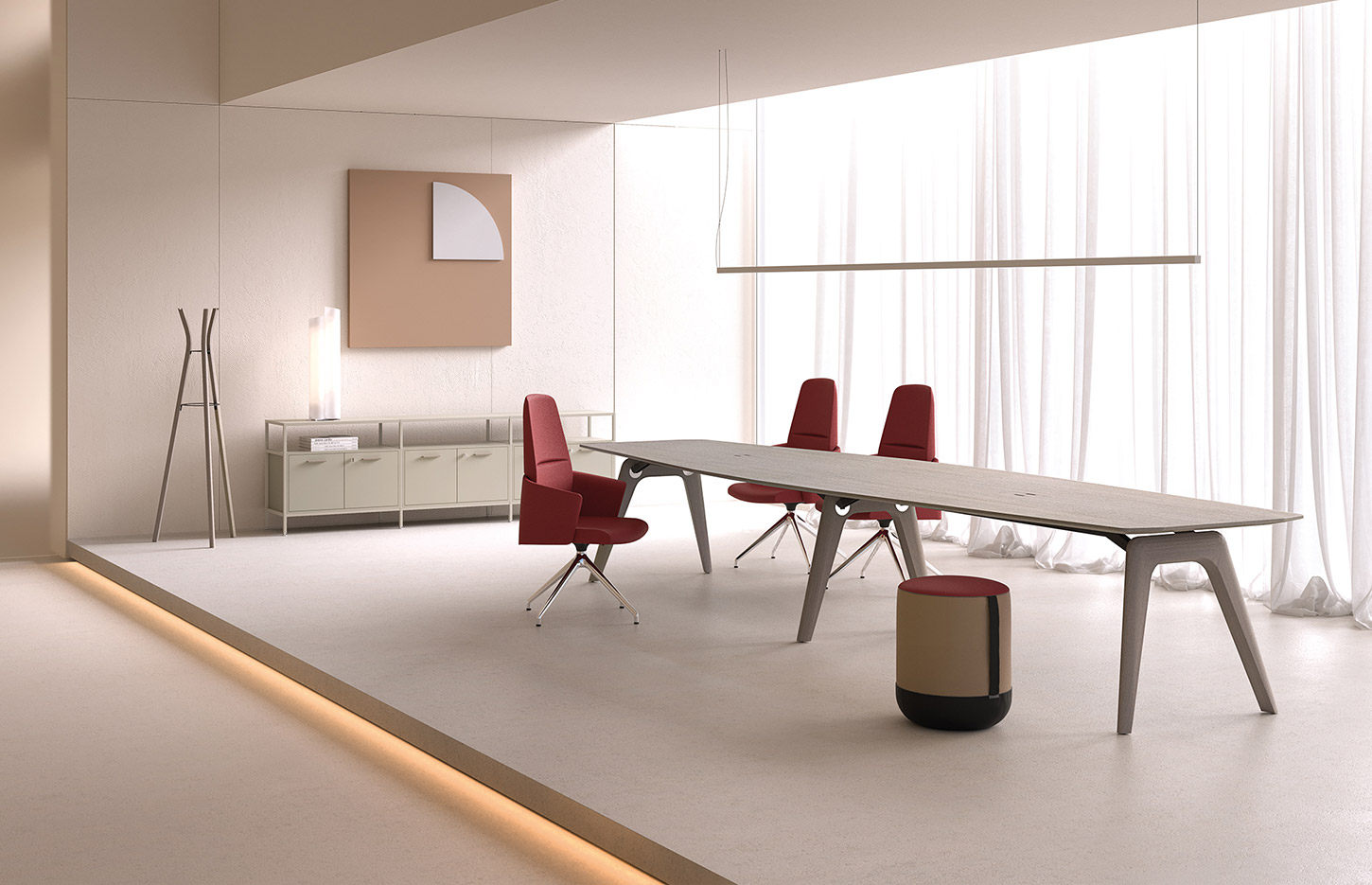 Table de réunion Longo avec fauteuils rouges dans un espace clair