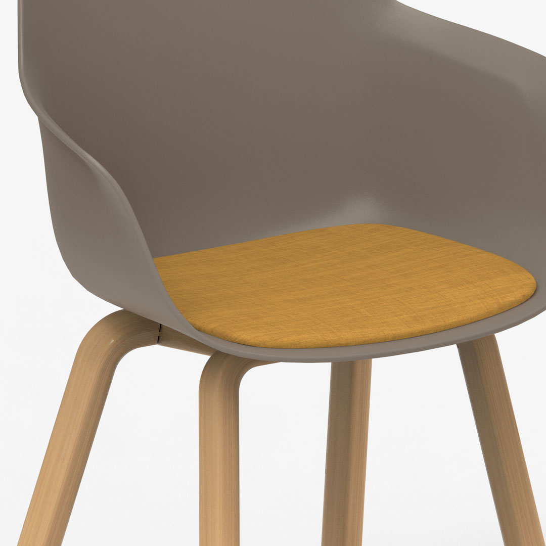 D&eacute;tail de l'assise Ortega Social avec galette moutarde, coque taupe, pieds bois